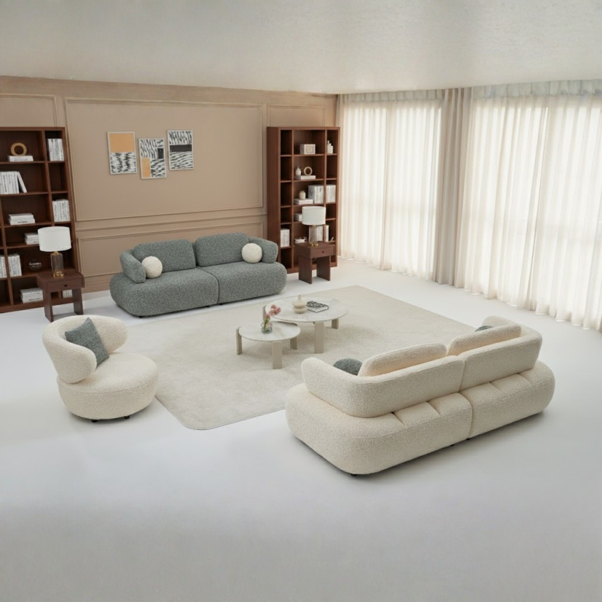 Modern living room with a gray sofa, white armchair, and a beige sectional sofa.