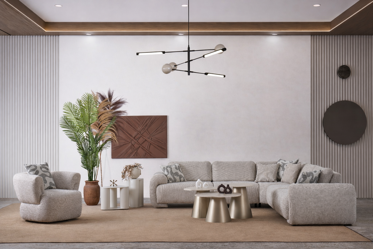 Modern living room with a gray sectional sofa, armchair, coffee table, and decorative elements.
